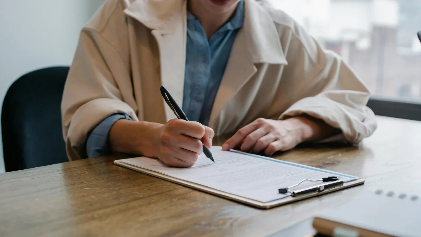 Woman filling out form