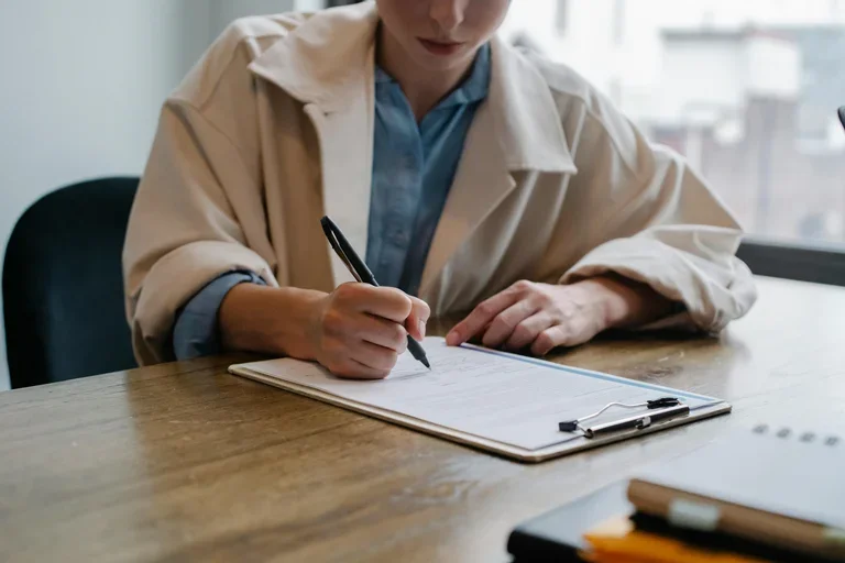 Woman filling out form