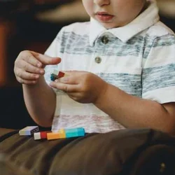 A child playing with lego